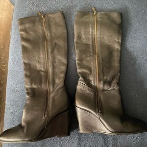 Steven by Steve Madden Leather Upper Wedge boots. Vibram heels. Size 6M. Black